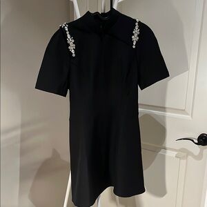 Elegant Black Dress with Embellished Shoulders